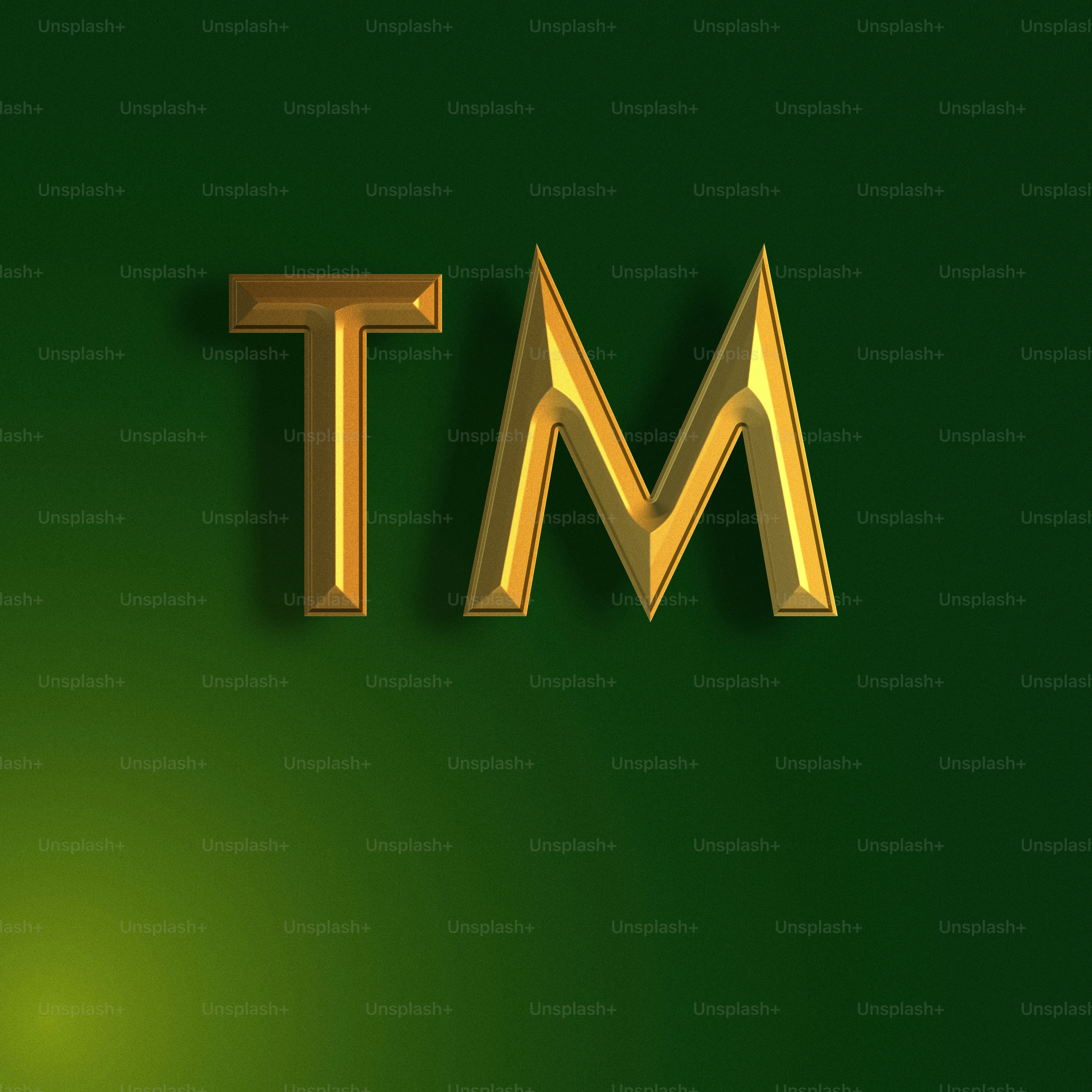 a gold letter that is on a green background